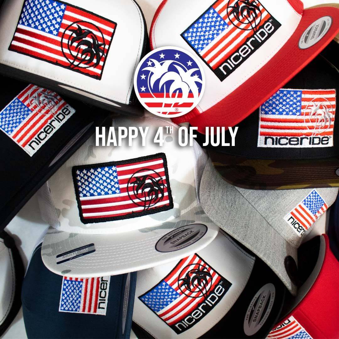 Colorful hats with American flags celebrating America on the 4th of July.