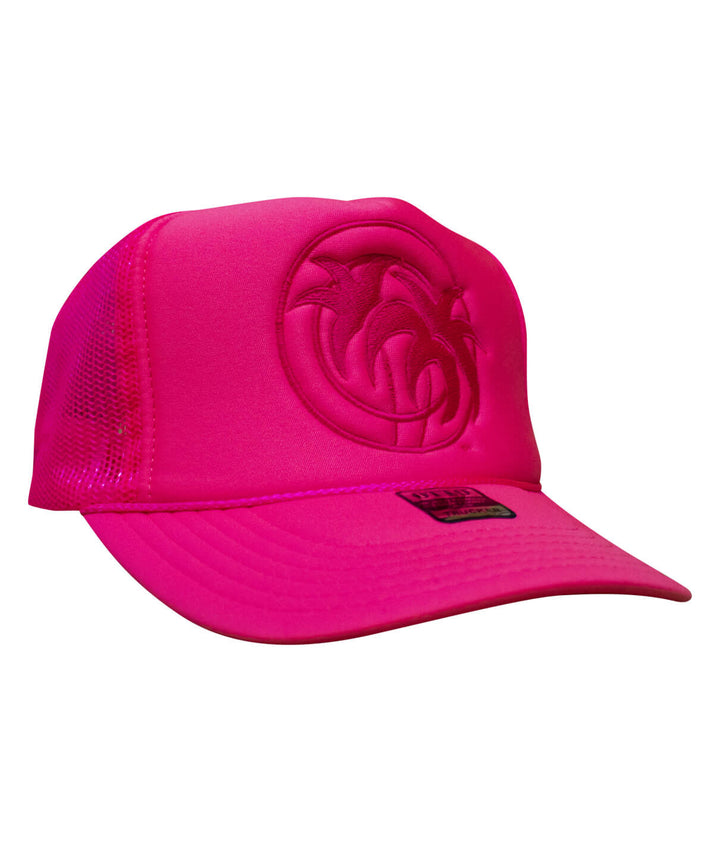 Hot Foam foam trucker hat in bright pink with embossed logo and breathable mesh design.