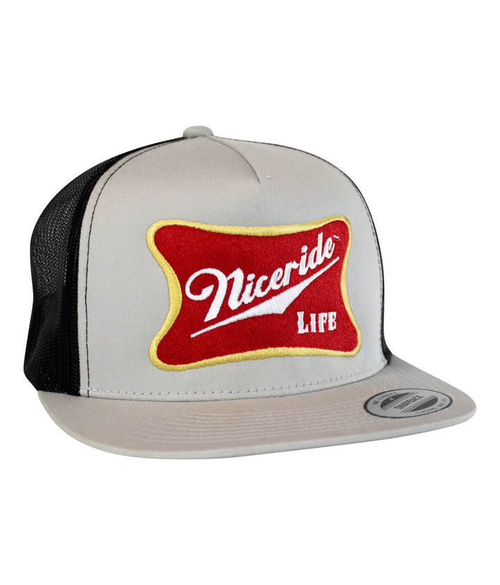 Biscuit Trucker Hat featuring NICERIDE embroidered design, a stylish hat for casual outings.