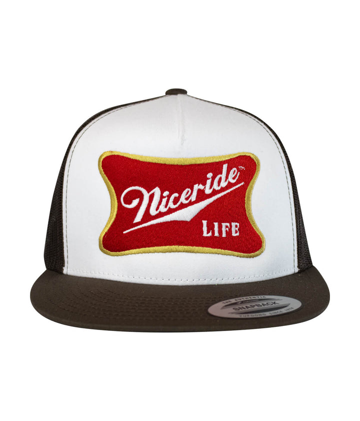 Biscuit Trucker Hat by NICERIDE featuring embroidered design and palm logo, perfect baseball hat for outdoor style.
