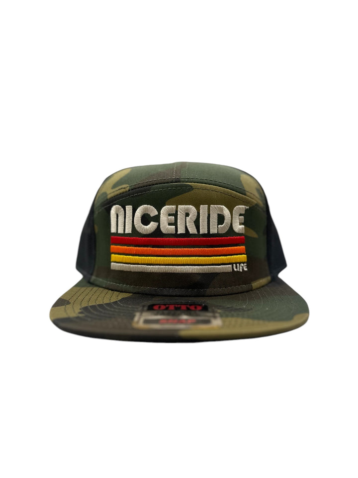 Trucker hat featuring NICERIDE design in camouflage with embroidered stripes and logo on the front.