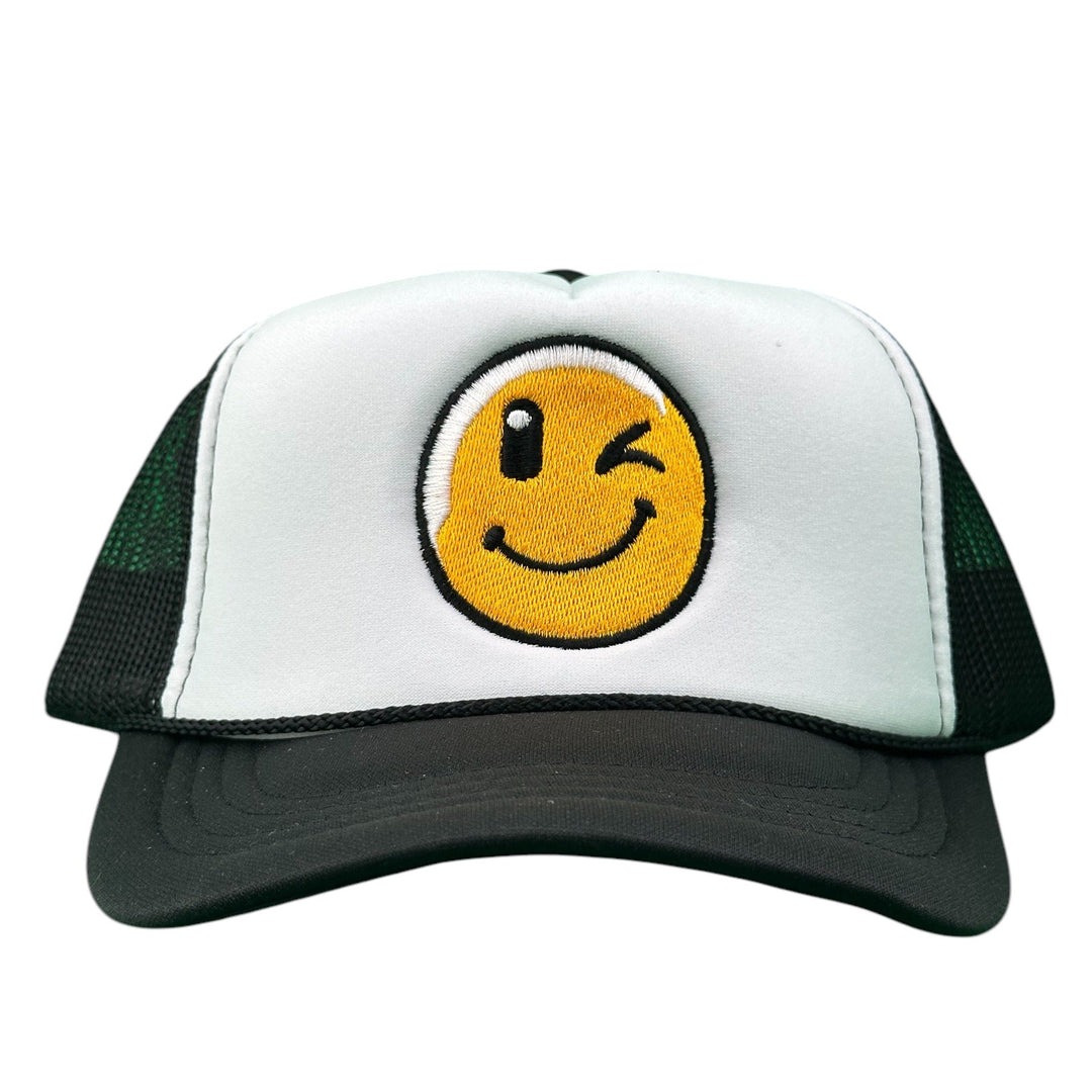 NICERIDE Wink Foam Trucker Hat, adjustable unisex cap with a playful smiling emoji design.