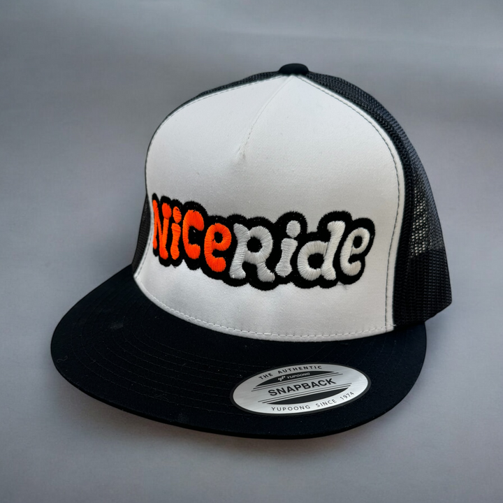 NICERIDE Cloud Nine classic snapback trucker hat with bold embroidered logo, black brim, and mesh sides.