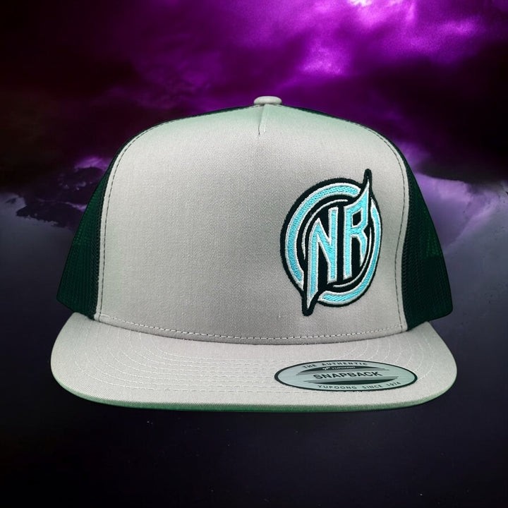 NICERIDE NR logo trucker hat in gray and green with snapback design against a dramatic purple background.