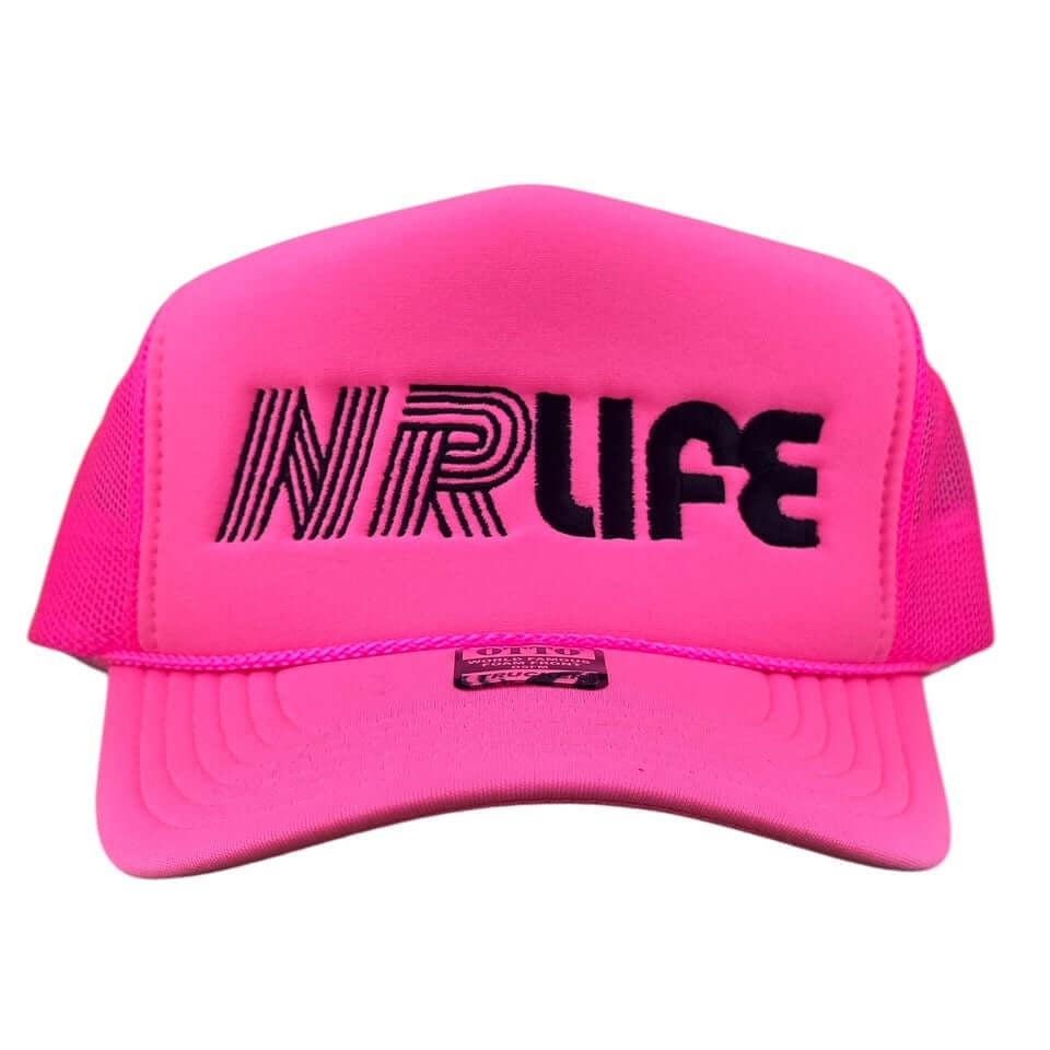 Bright pink trucker hat featuring NR LIFE logo in bold black text on the front.