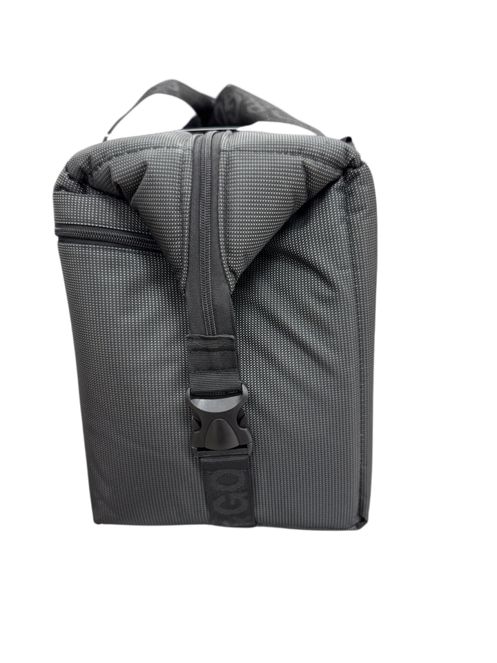 Backstreet ballistic soft sided AO cooler with gray fabric and strap, designed for insulation and durability.