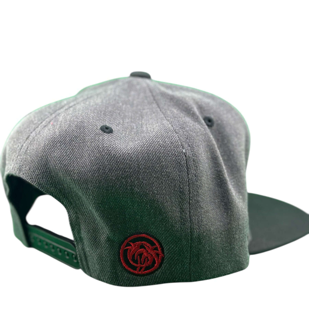 Back view of NICERIDE Pro unisex adjustable trucker hat with red logo on a dark fabric.