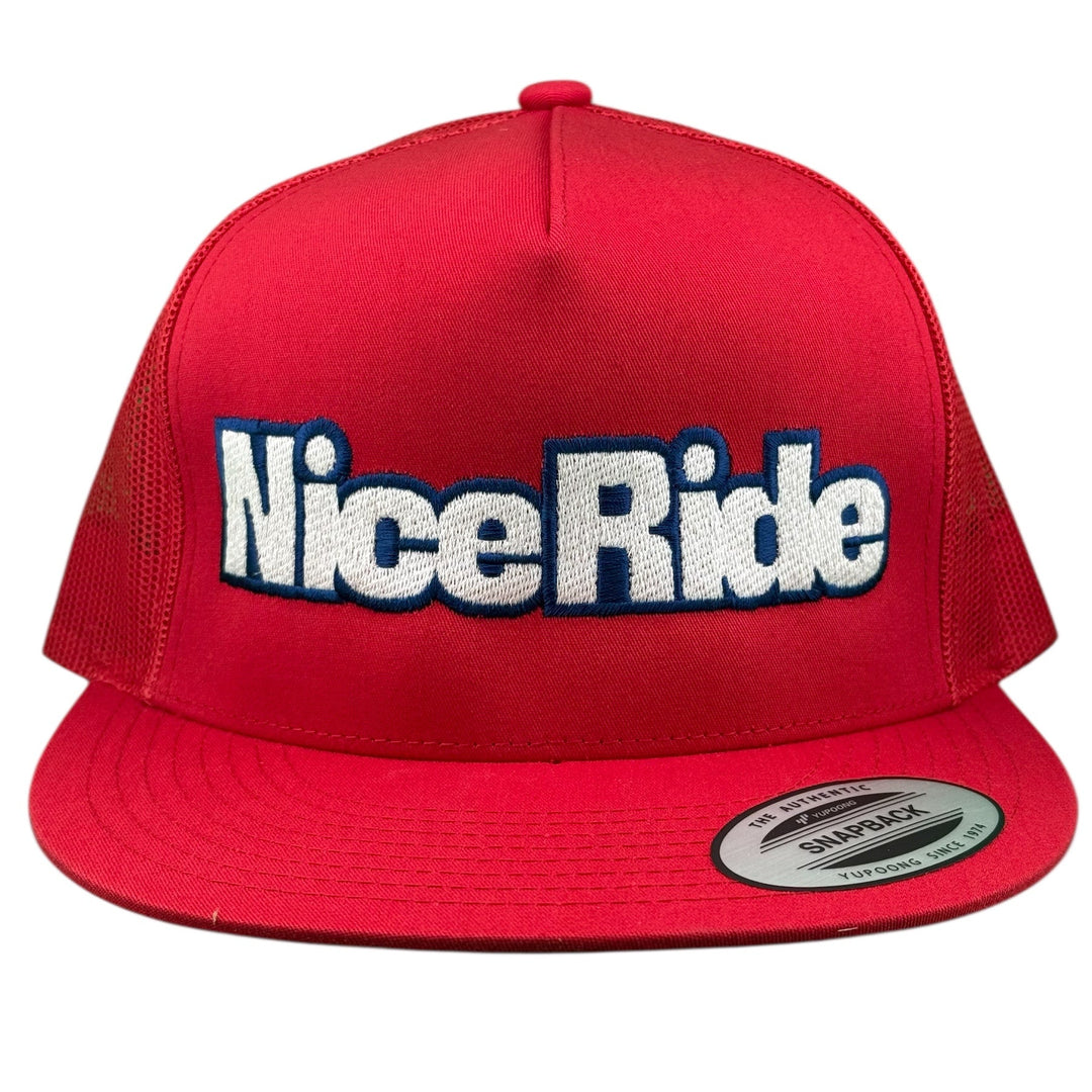 Red adjustable trucker hat featuring embroidered "Nice Ride" logo on the front panel, perfect for any casual occasion.