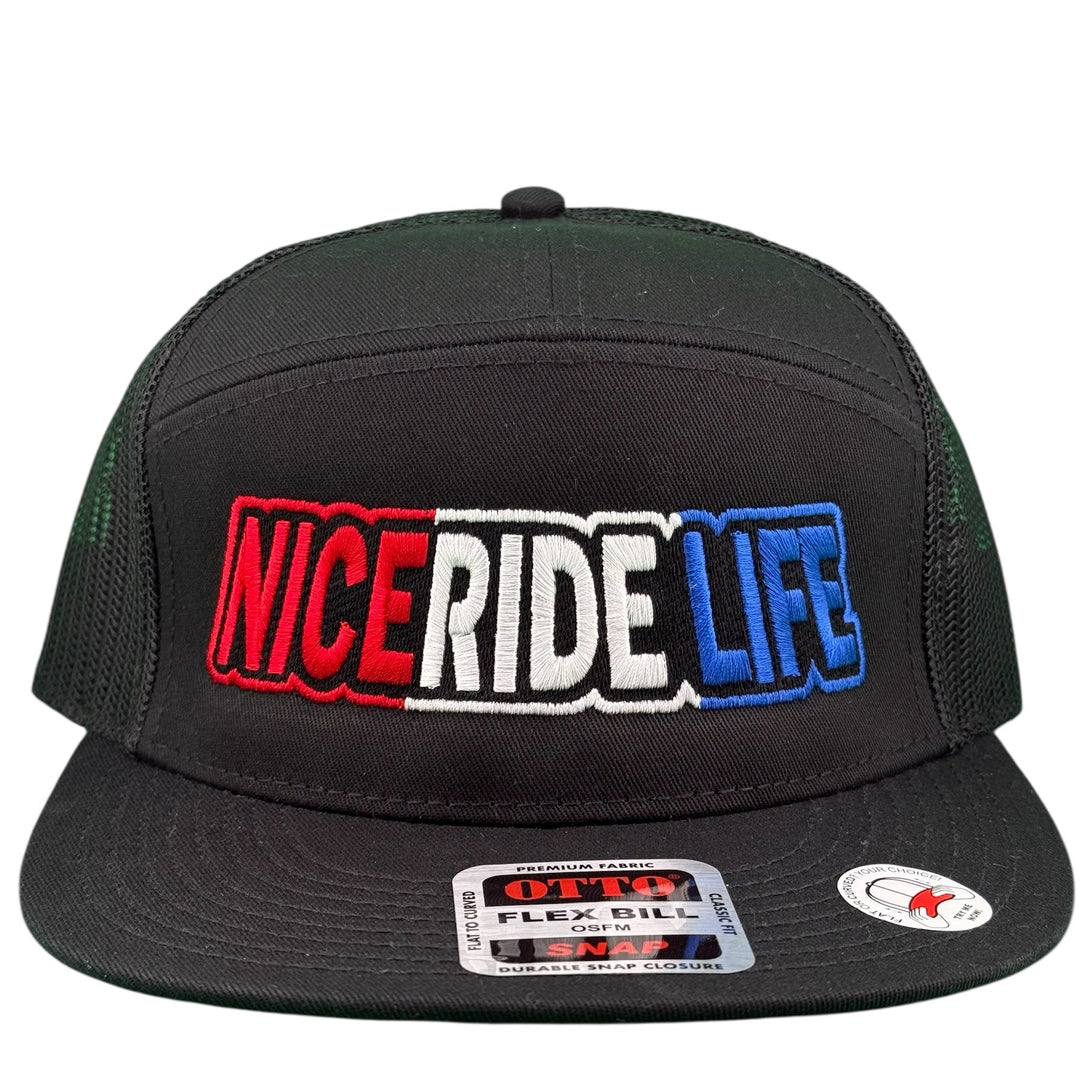 Close-up of Otto Flex Fit black snapback cap featuring colorful 'Nice Ride Life' embroidered text in red, white, and blue.