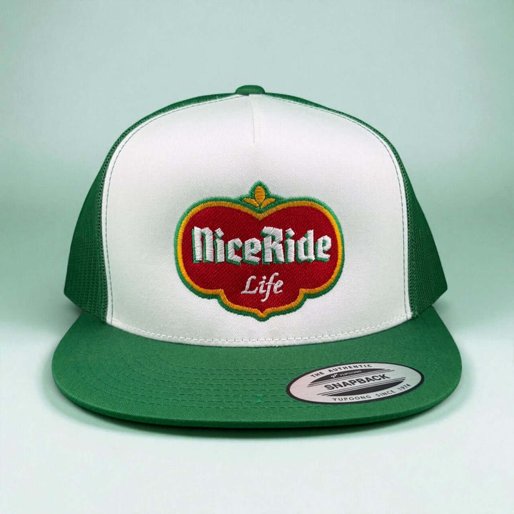 Dented unisex trucker hat featuring Niceride logo in red and green on white front panel.