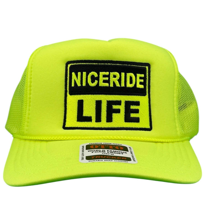 Caution Foam Trucker Hat by NICERIDE in vibrant yellow with bold embroidered logo.