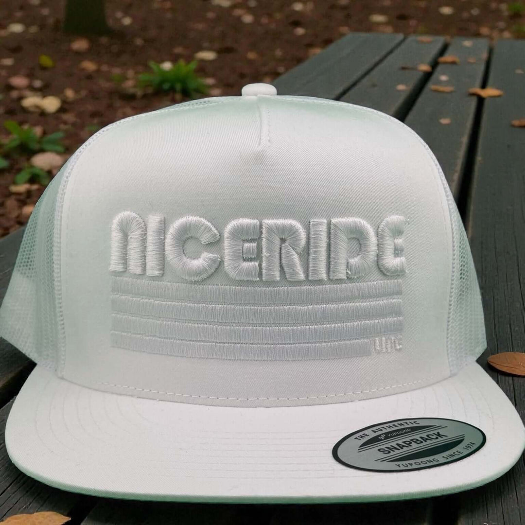 NICERIDE 3D Puff unisex adjustable trucker hat featuring white raised embroidery on front panel.