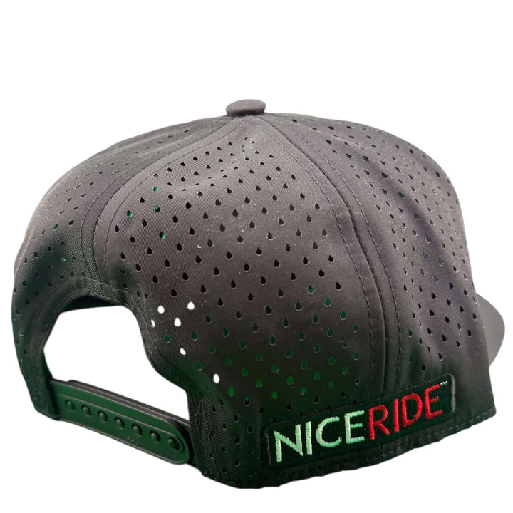 Back view of the NICERIDE Rojo Negro 5-Panel Performance Golf Trucker Cap showcasing the laser-cut mesh design.