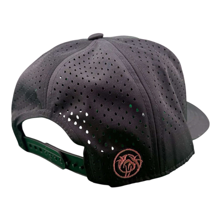 Back view of the Whole Heart embroidered 5-panel performance golf trucker cap featuring laser-cut mesh and snapback.