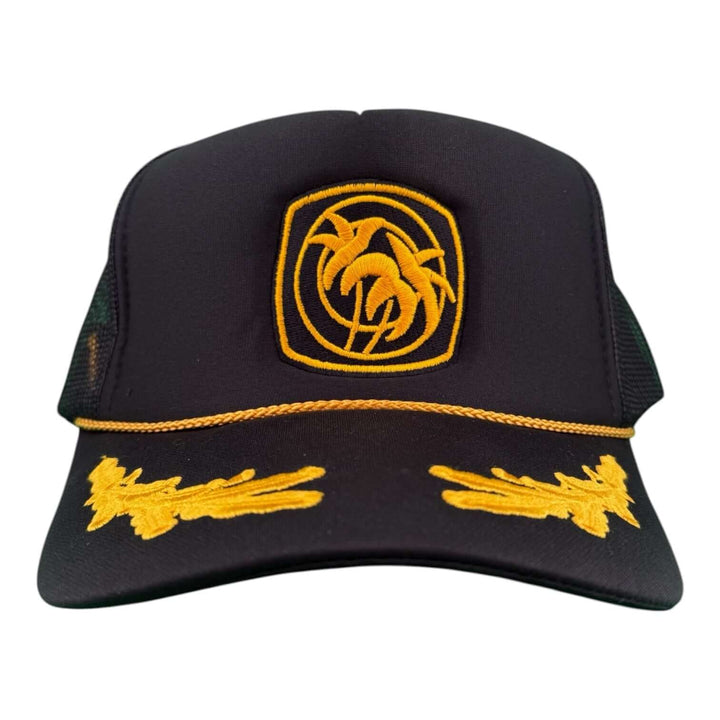 Below Deck Moe Doe hat featuring a black foam cap with palm tree logo and yellow embroidery.