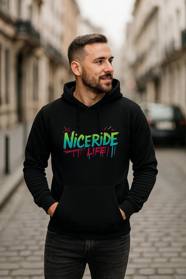 Comfortable unisex black hoodie worn by man, featuring bold NICERIDE LIFE embroidered design in vibrant colors.