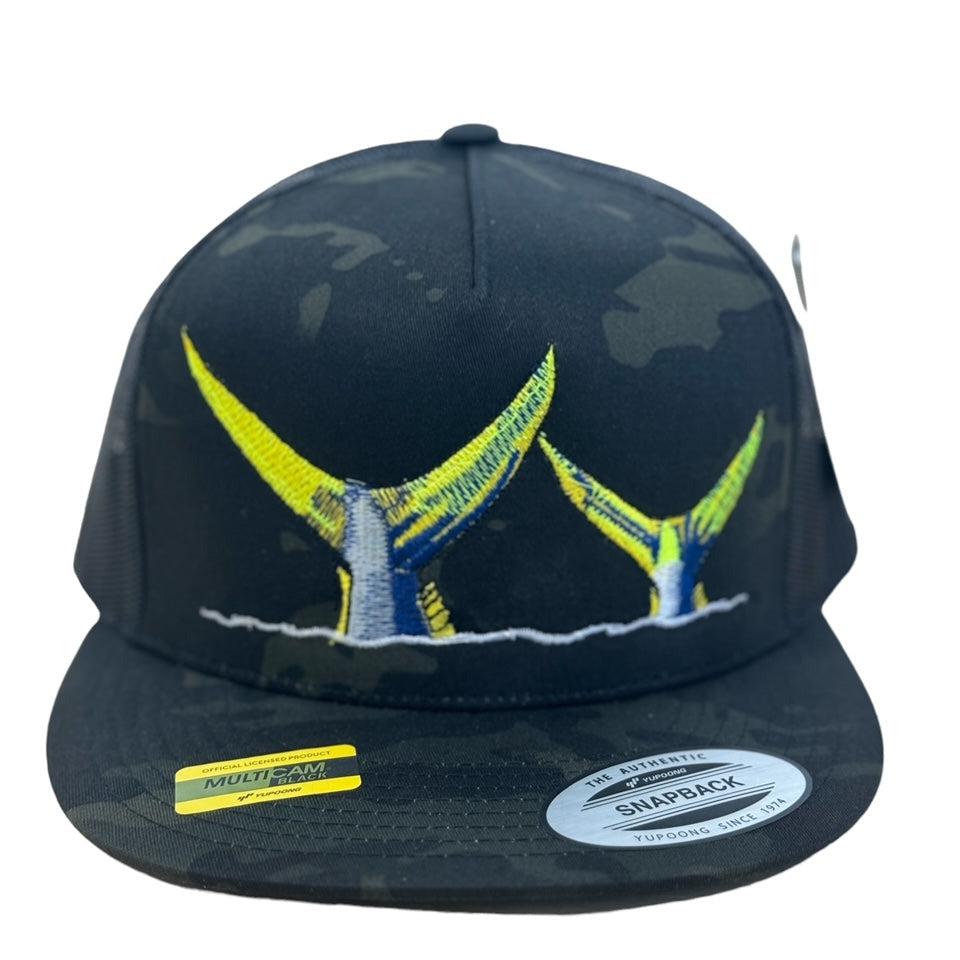 NICERIDE 'Tall Tails' trucker hat featuring embroidered whale tails design on a black camo snapback cap.