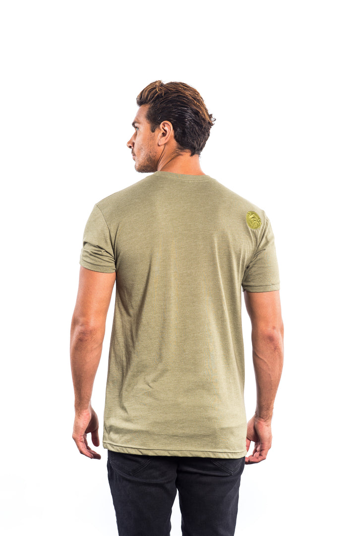 Back view of a man wearing a green Tone - Men&
