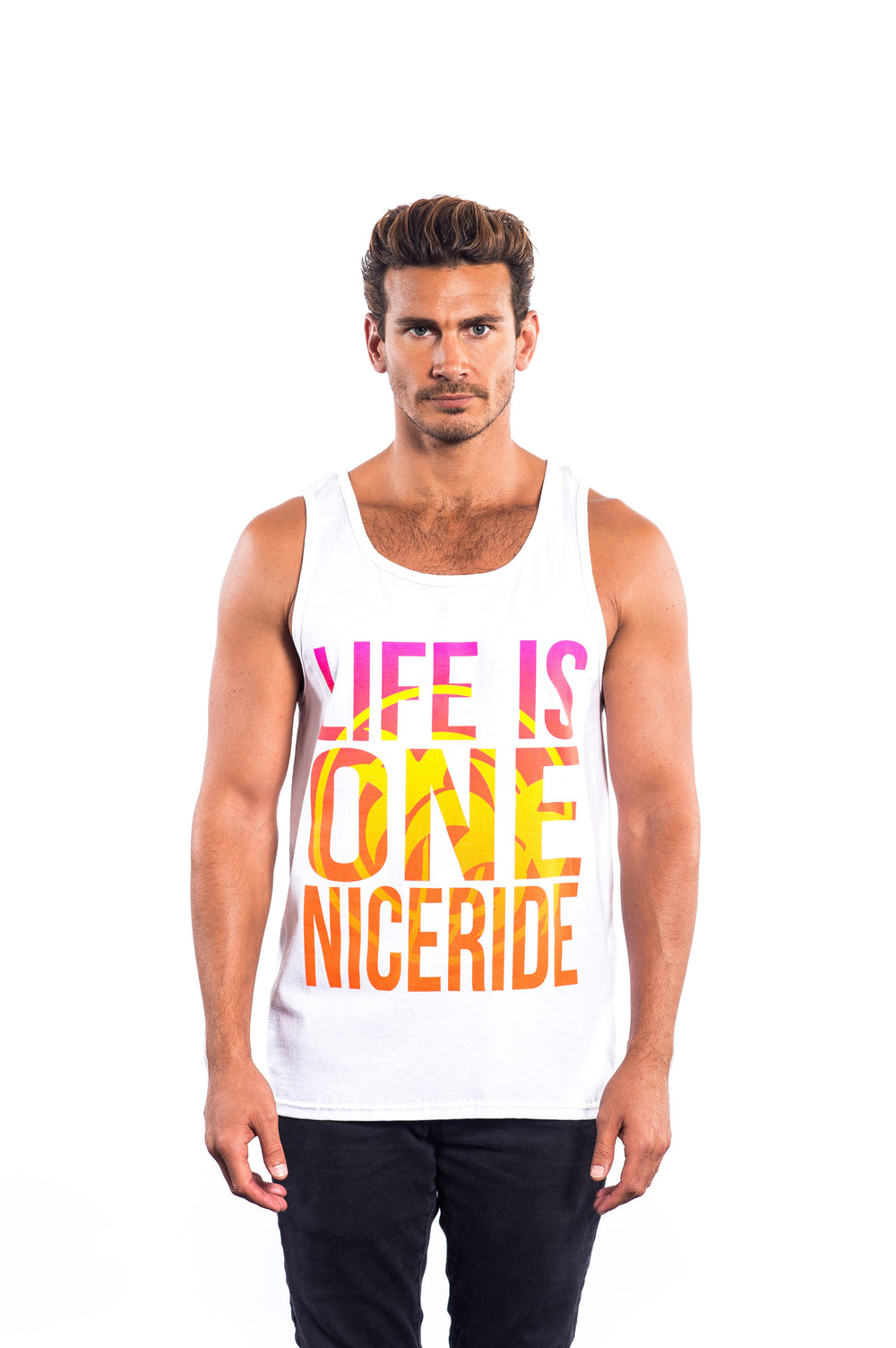 Model wearing Endless Ride Men's White 100% Cotton Tank Top with colorful 'Life is One' design.