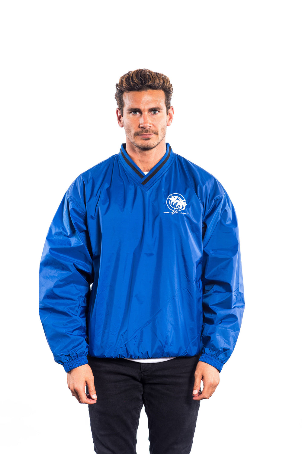 Classic Palm unisex windbreaker pullover in blue with logo, designed for protection against wind and light rain.