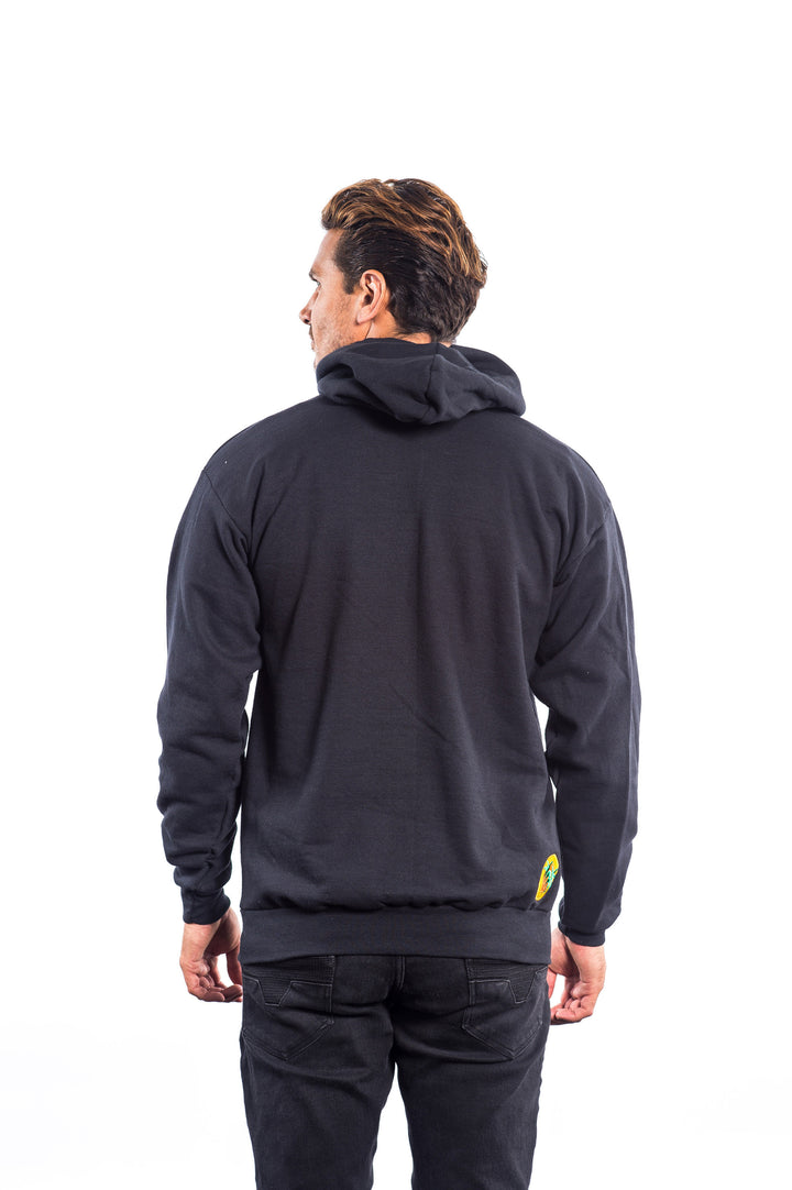 Back view of a man wearing The Badge black unisex pullover hoodie, showcasing the design and classic palm logo.
