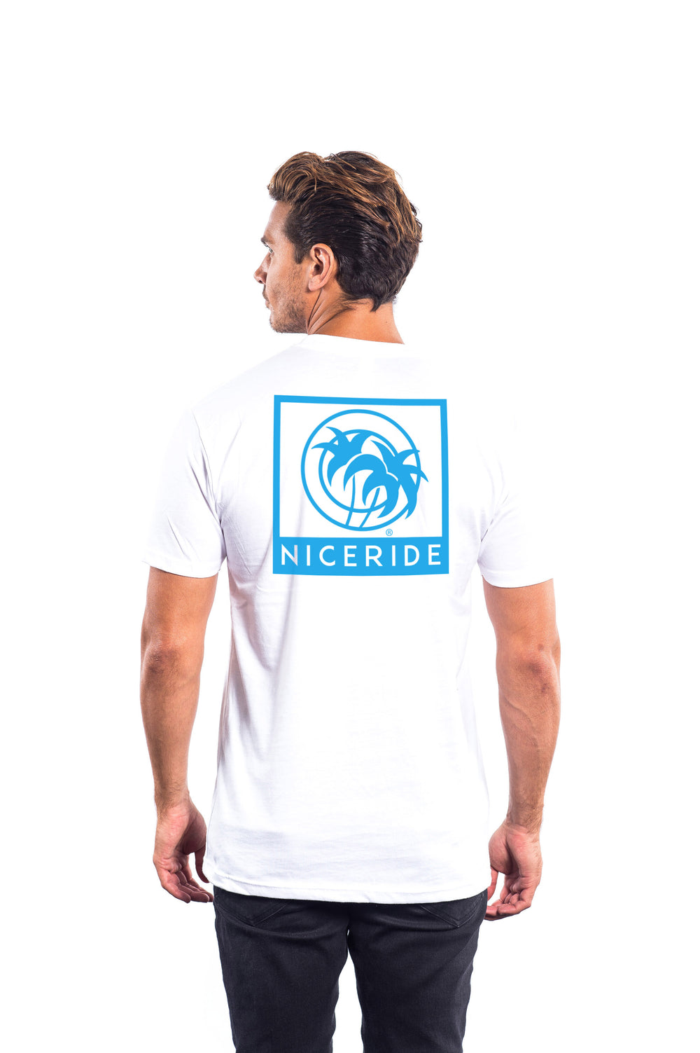 Man wearing The Palm - White Next Level Men's Short Sleeve Shirt with NICERIDE design on back.
