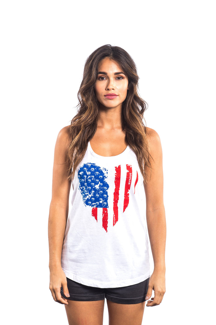 Woman wearing a white tank top featuring a heart-shaped American flag design, showcasing comfort and style.