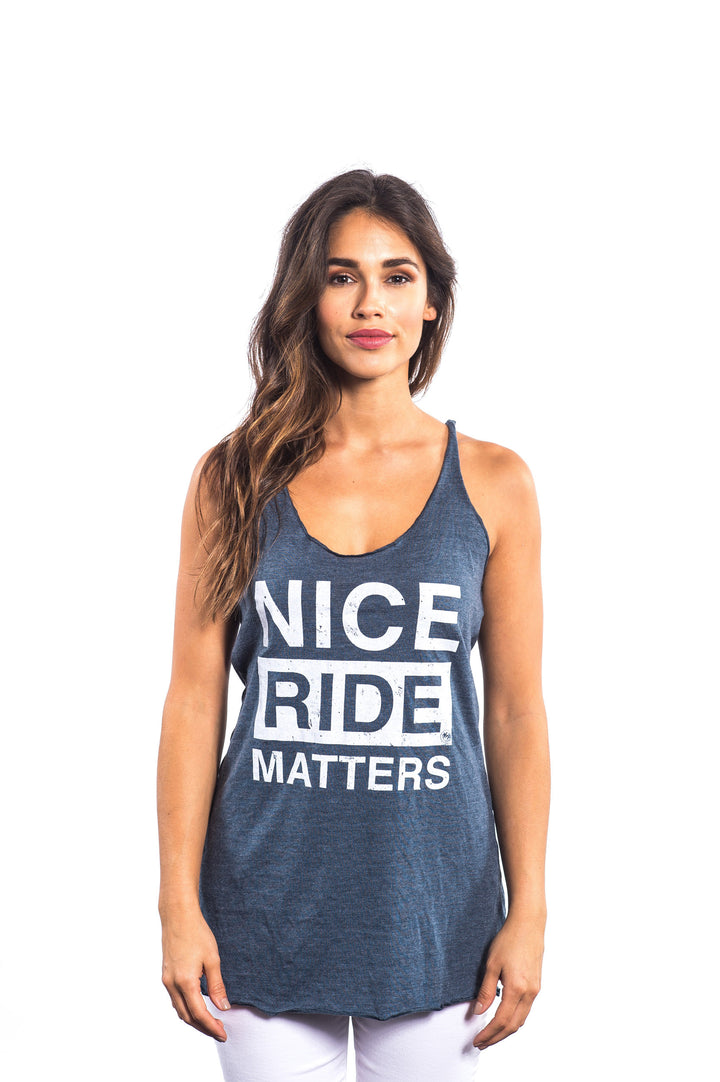 NICERIDE Matters blue tank top shirt on model showcasing front design and comfortable fit.