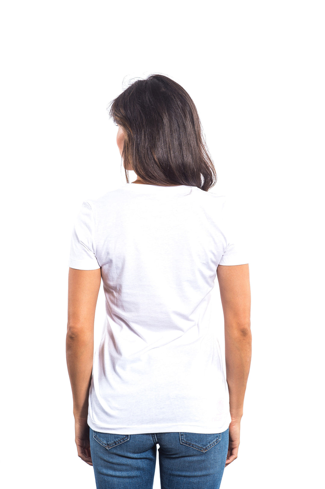 Back view of woman wearing a white shirt from NICERIDE with a fitted silhouette.