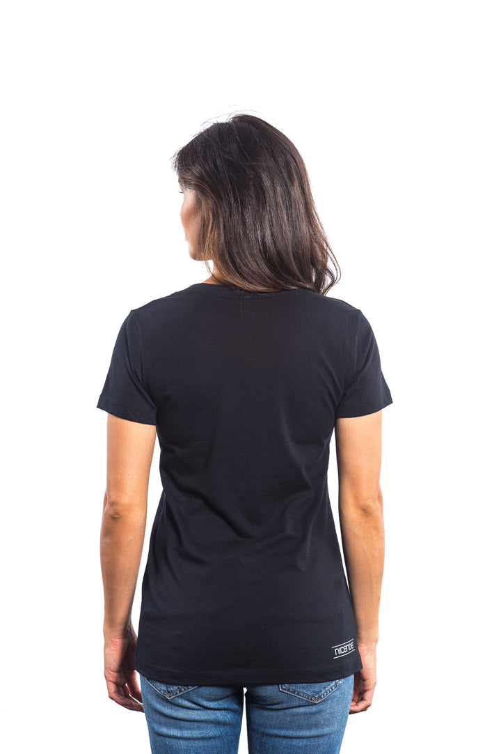 Back view of a woman wearing a black shirt, showcasing the soft fabric and comfortable fit for casual wear.