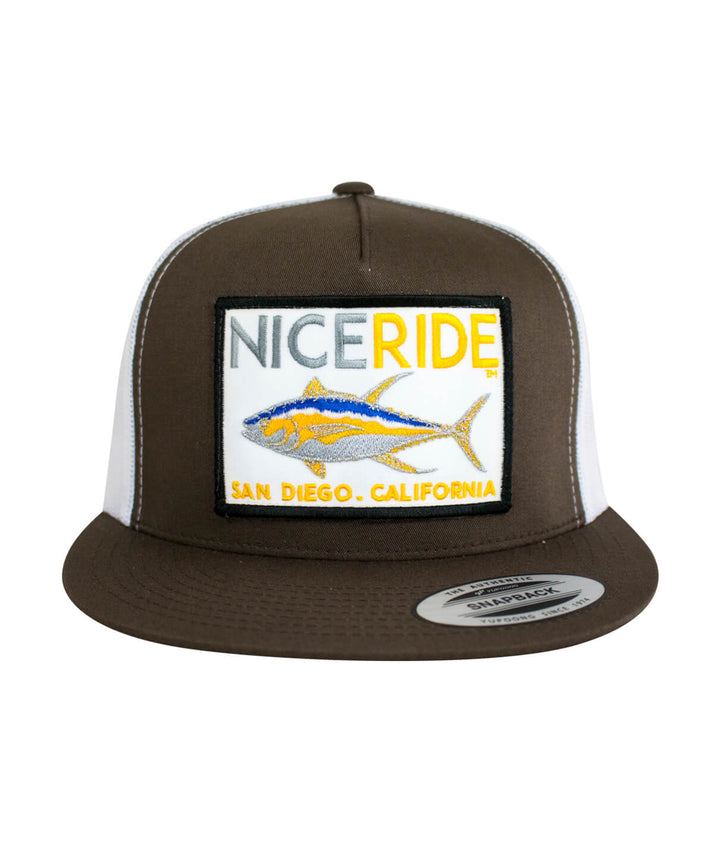 Brown and white trucker hat featuring NICE RIDE embroidered patch, perfect for casual outings and outdoor activities.