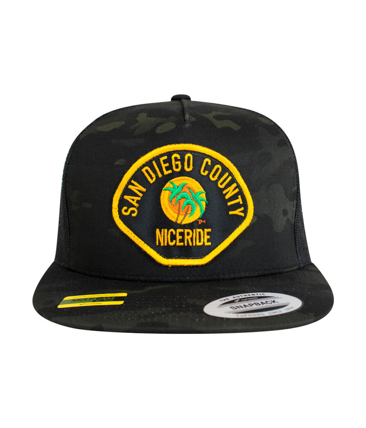 The Badge trucker hat featuring embroidered San Diego County design and NICERIDE logo, perfect stylish hat for summer.