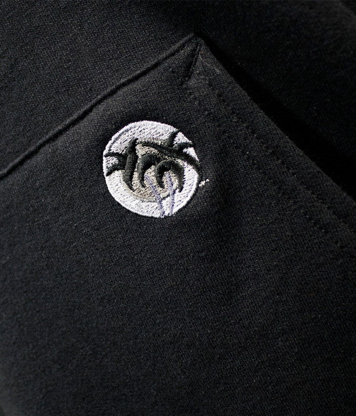 Close-up of the palm logo embroidered on the pocket of the NICERIDE &