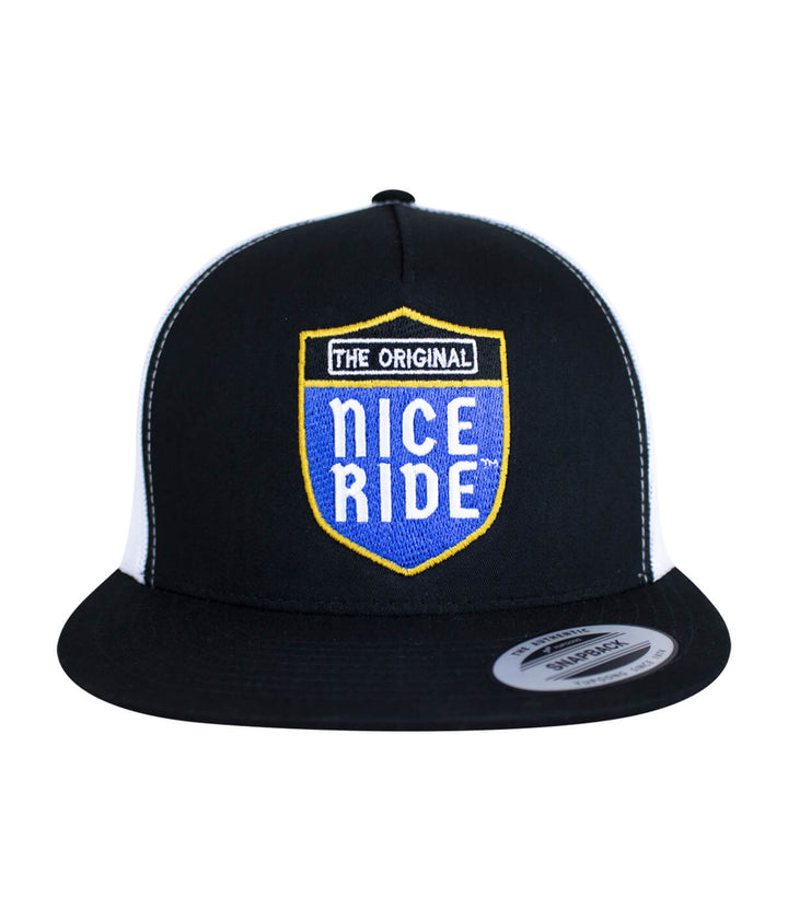 Majesty hat featuring NICERIDE logo embroidered on the front, classic black snapback trucker style.