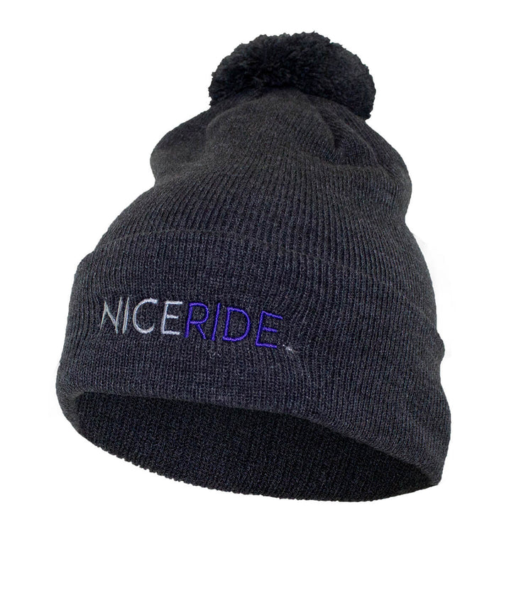 NICERIDE puff beanie in soft charcoal grey with pom pom and embroidered logo, perfect beanie for winter wear.