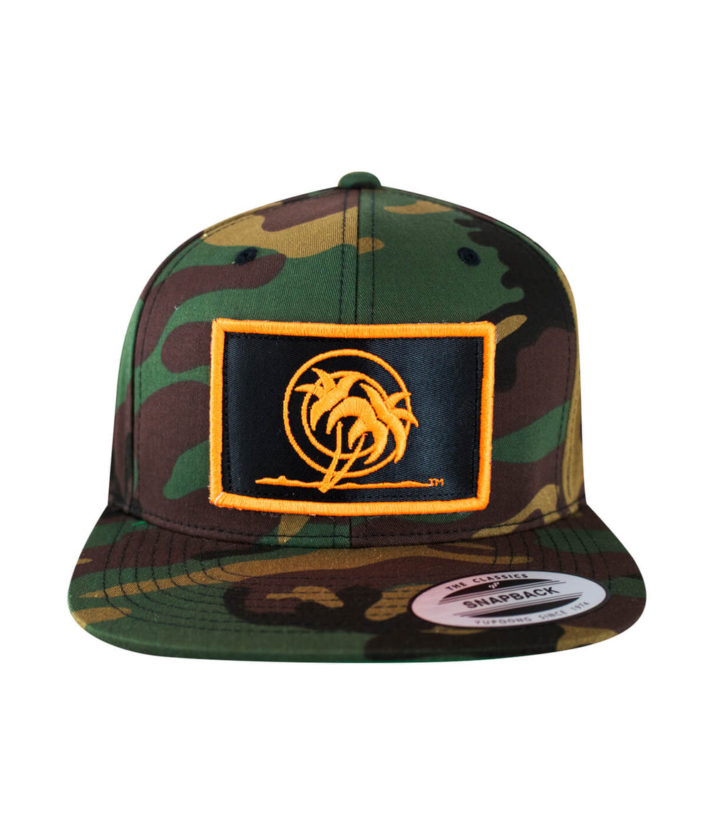 Jungle Fever snapback hat with stenciled palm patch, camouflage design, classic hat style.