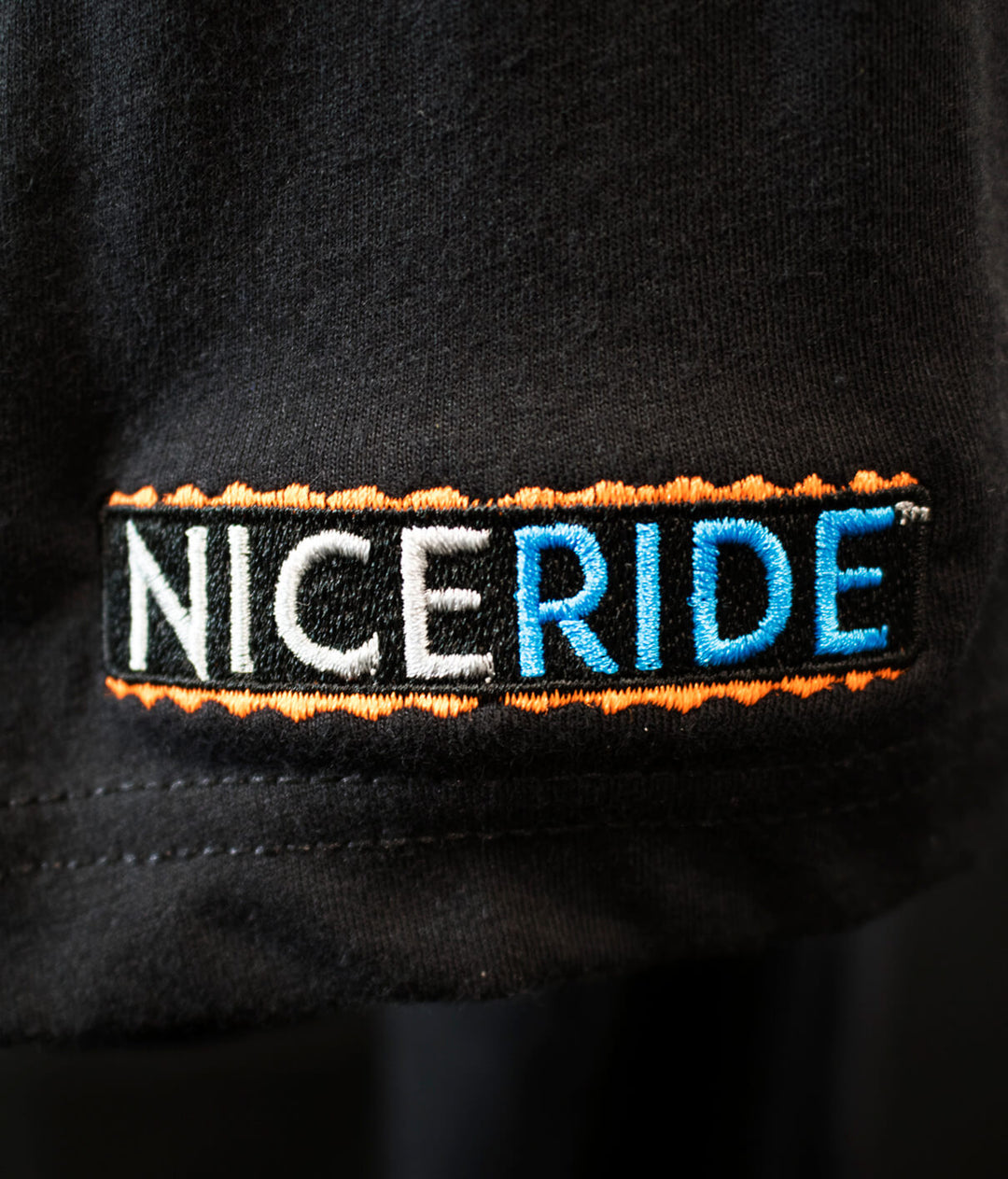 NICERIDE embroidered logo on black fabric of BUCK-EYE men&