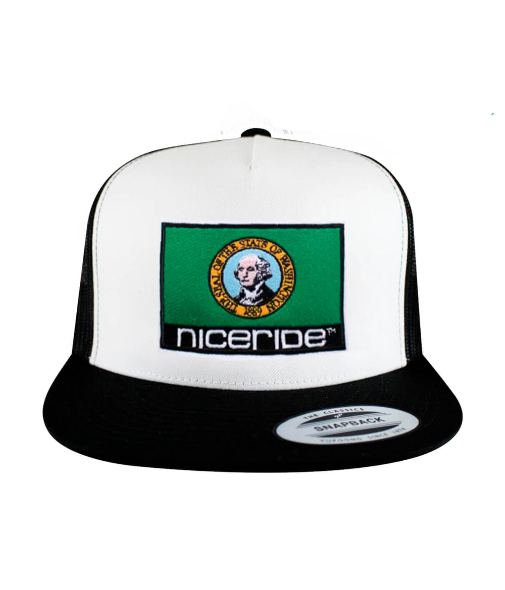 Washington flag trucker hat featuring NICERIDE embroidery on the front and a classic palm logo on the side.