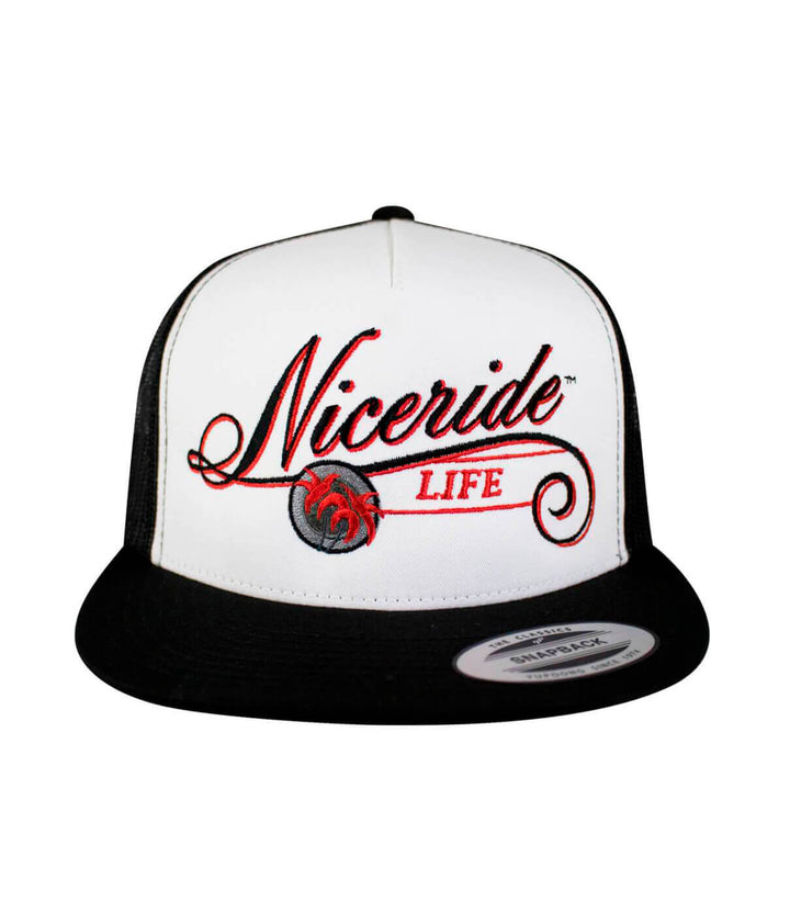 The LIFE - Red trucker hat featuring embroidered Niceriide design and black palm logo.