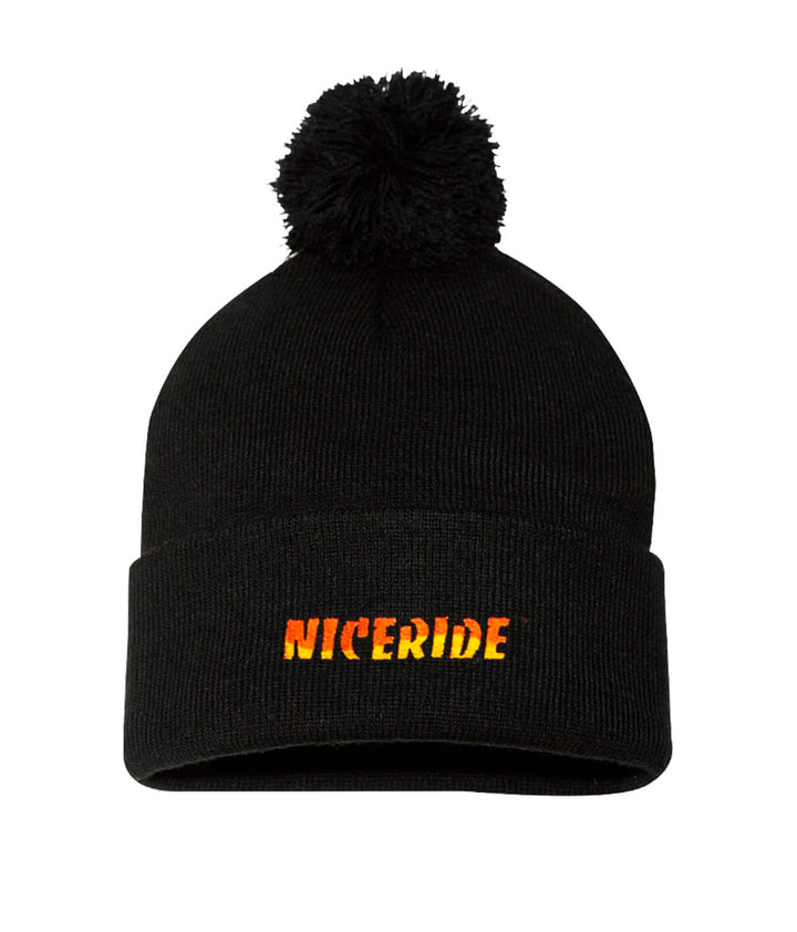Classic NICERIDE puff beanie in black with pom-pom and NICERIDE logo embroidered on front.