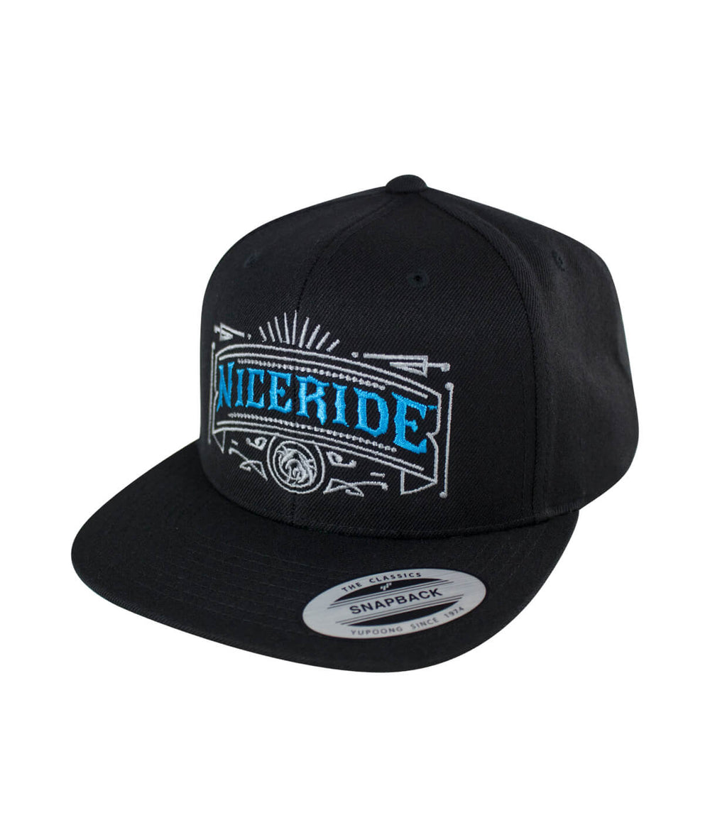 Cholo Snapback hat featuring NICERIDE's embroidered design on a classic black cap.