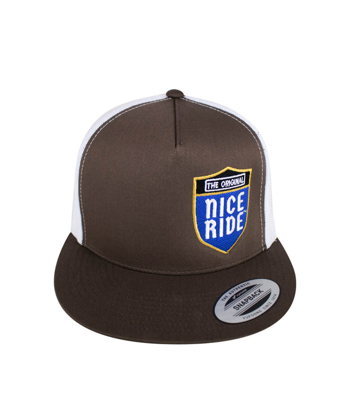 Majesty Trucker Hat featuring NICERIDE design embroidered on brown fabric.