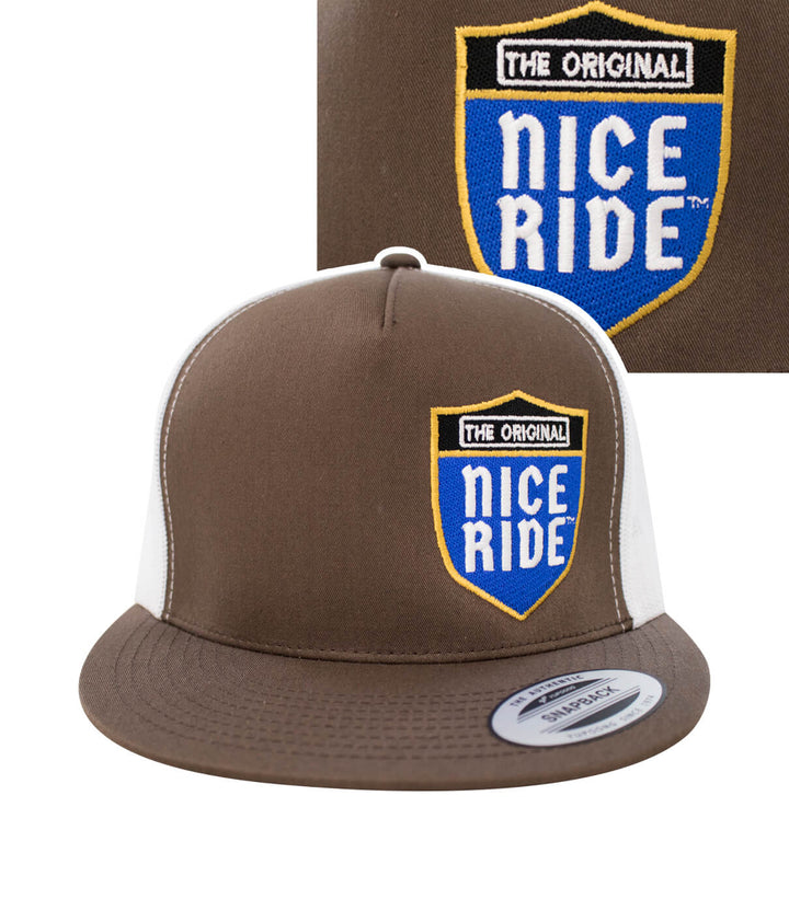 Majesty trucker hat featuring NICERIDE design in embroidered blue and yellow on front and back.