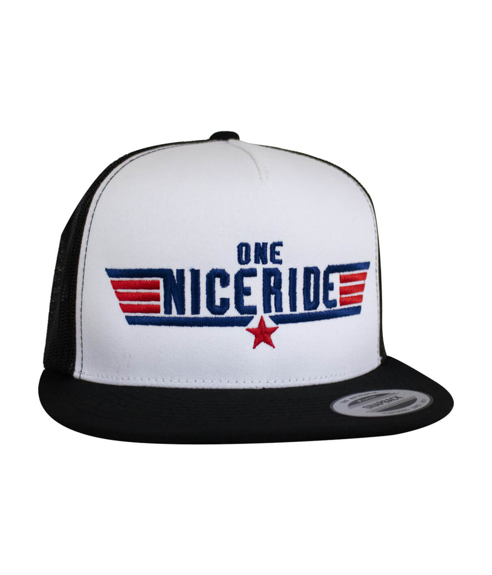 NICERIDE 'Shot Down' trucker cap featuring embroidered logo in red, white, and blue on a classic black and white design.
