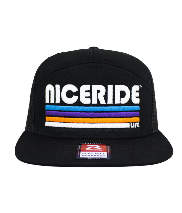 NICERIDE flat bill trucker hat featuring colorful embroidery against a black background, perfect for casual style.