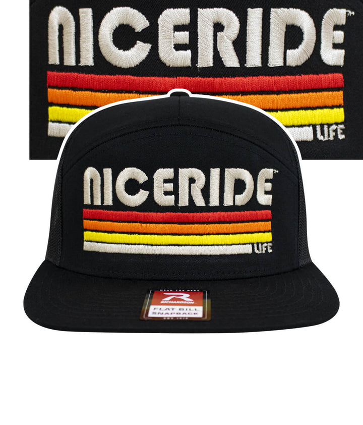 NICERIDE "Trigger" 7-panel trucker hat in Evening Glow design, featuring embroidered logo and vibrant stripes.