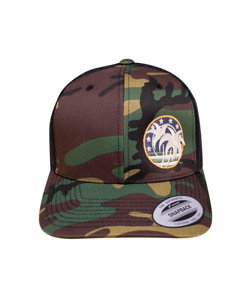 Camo retro trucker hat with palm tree logo and stars design, perfect for outdoor activities.