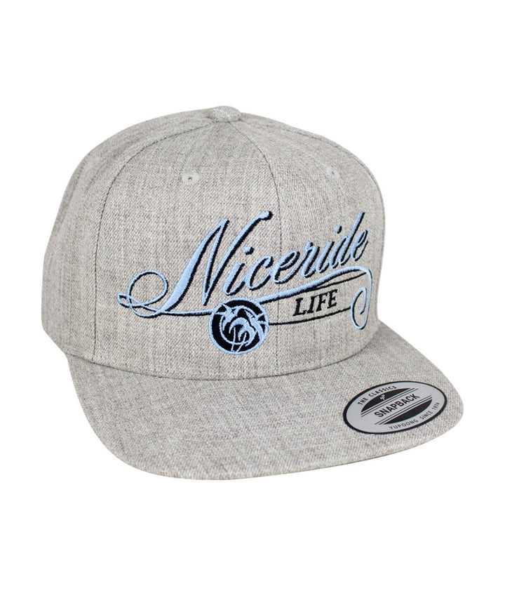 The Life Snapback Hat featuring NICERIDE embroidery and classic palm logo, a stylish baseball cap.