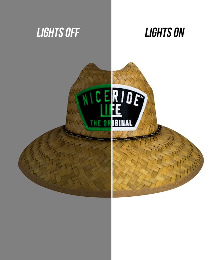 Grinder Evening Glow straw sun hat for kids with NICERIDE patch, displayed in lights off and lights on.