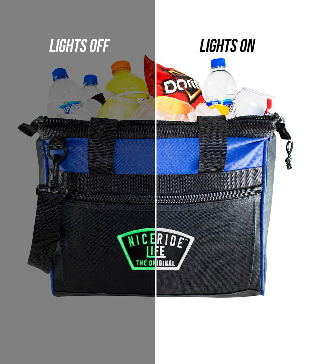 Grinder Evening Glow Big Mouth Cooler with drinks and snacks, showcasing the cooler's dual light feature.